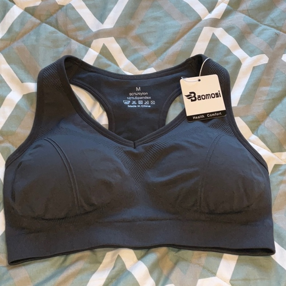 Baomosi Sport bra. Size medium more like a small. Pads come out. Gray in color.